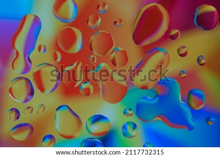 Abstract colorful background. Dew drops. Colored bubbles reflect a rainbow of colors. Macro shot close-up