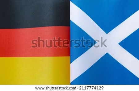 fragments of the national flags of Germany and Scotland in close-up