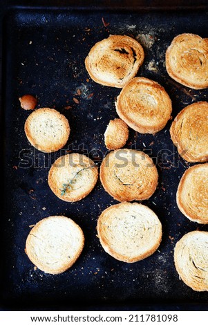 toasted bread on a baking sheet, food closeup