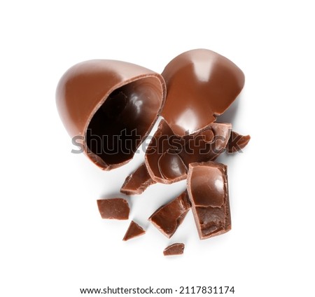Broken chocolate Easter egg isolated on white background Royalty-Free Stock Photo #2117831174