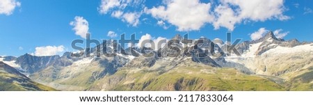 Panoramic mountain landscape in Zermatt, Switzerland. Mountain chain in the swiss alps.  Royalty-Free Stock Photo #2117833064