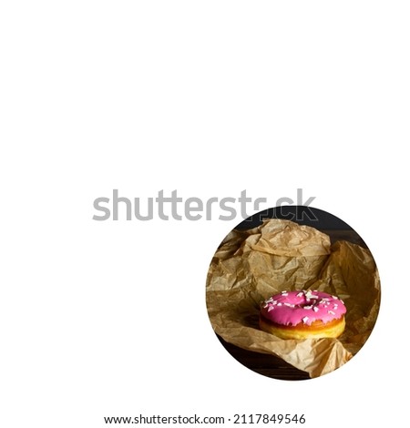 pink donut on wrapping paper. copy space. white background.