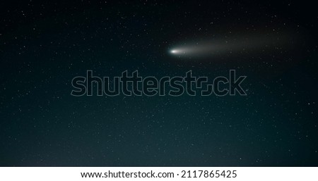 comet flying through the starry night sky. Comet free photo, comet high quality photo, comet stock photo, comete mockup