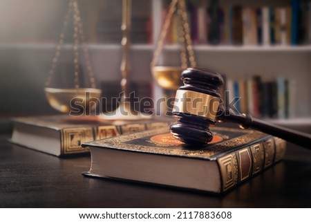 Judge's gavel and weight scale. Law and justice system.