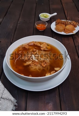 Soto is a traditional Indonesian soup mainly composed of broth, meat, and vegetables. Many traditional soups are called soto.SOTO SEMARANG served with perkedel and sate kerang.