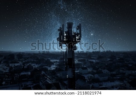 Telecommunication tower of 4G and 5G cellular. Base Station or Base Transceiver Station. Wireless Communication Antenna Transmitter. Telecommunication tower with antennas against blue sky. Royalty-Free Stock Photo #2118021974