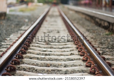 Close up of railroad tracks Royalty-Free Stock Photo #2118052397