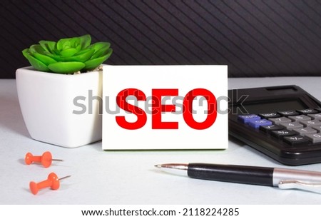 Word seo. Wooden small cubes with letters isolated on white background with copy space available.Business Concept image.