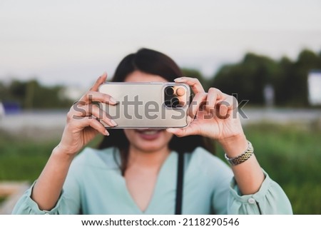 Close up of people holding smartphone and take the picture, concept of take the picture.