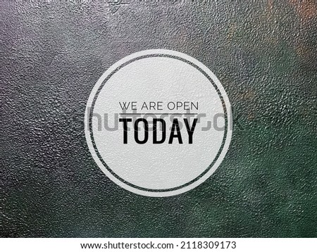 Open today word concept with dark background