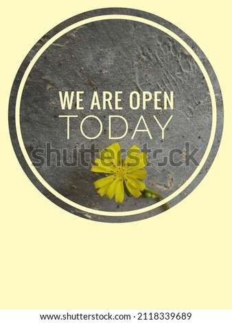 "We are Open today" word concept with yellow flower background."