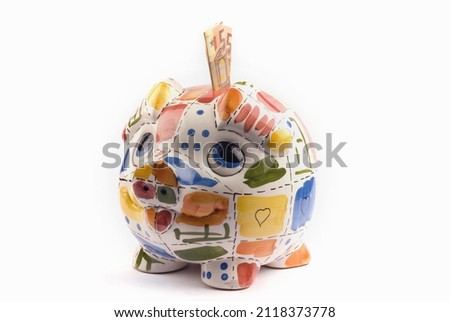 Photo of a piggy bank as a symbol of luck, save bank, security,
Earn money.