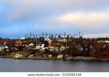  View from the ship on the coast of Stockholm's Gamla Stan district with the old buildings of the city.