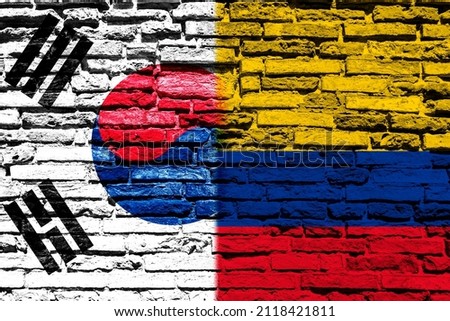 Background with flag of South Korea and Colombia on a brick wall