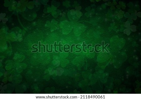 Elegant dark green background with shamrock and old vintage grunge texture. St. Patrick's Day banner design. Royalty-Free Stock Photo #2118490061