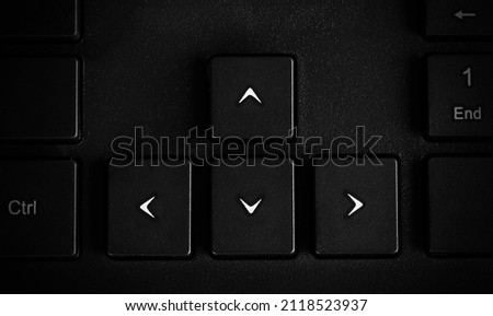 Keyboard arrow cursor keys buttons  background and texture, side view