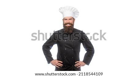Confident bearded male chef in white uniform. Serious cook in white uniform, chef hat. Portrait of a serious chef cook. Bearded chef, cooks or baker. Bearded male chefs isolated. Cook hat. Royalty-Free Stock Photo #2118544109