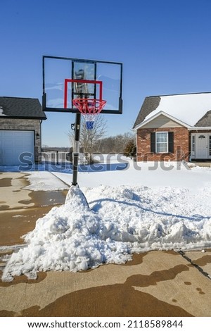 basket ball winter play after a snow blizzard in St louis, Mo