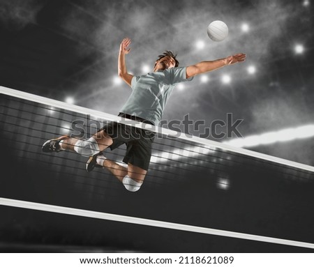 Volleyball player players in action. Sports banner. Attack concept with copy space Royalty-Free Stock Photo #2118621089