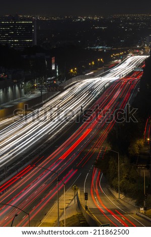Fast night traffic on the San Diego 405 Freeway in west Los Angeles, California.