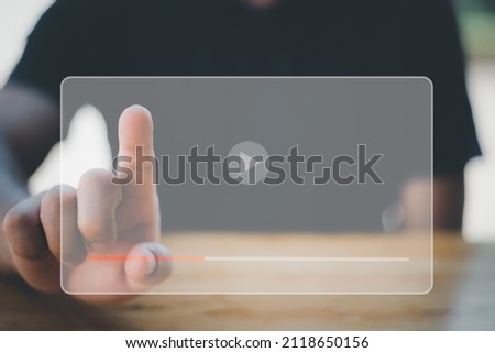 Hands of man using laptop to stream online Watch internet videos,tutorials using your mouse and keyboard to stream online. Watch videos on the Internet, live performances, performances, or tutorials. Royalty-Free Stock Photo #2118650156