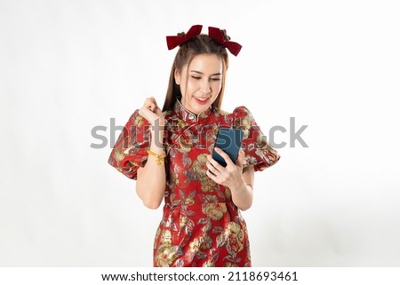 Asian woman wearing chinese dress with mobile smart phone shopping online technology cheongsam,qipao concept on white isolated background