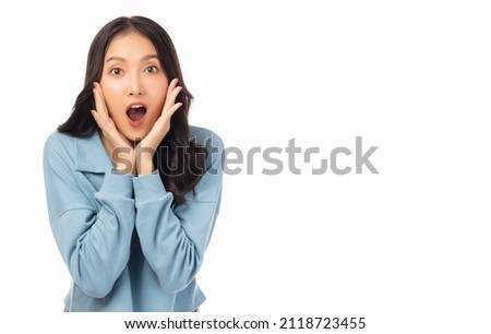 Girl get surprised look at camera Surprised happy beautiful asian woman open mouth with exciting Use for product, advertising Isolated on white background and copy space Expressive facial expression