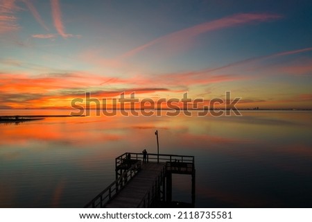 Mobile Bay pier at sunset on the Alabama Gulf Coast in January of 2022