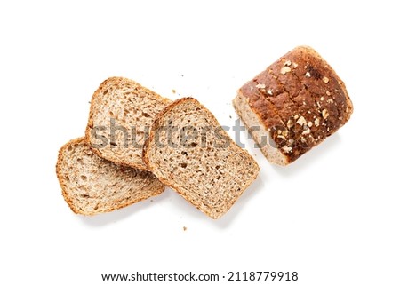 Sliced bread isolated on white background. Slices  bread and crumbs, top view. Royalty-Free Stock Photo #2118779918