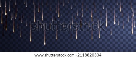 Shimmering golden particles. Meteor Rain. Falling glowing comets on transparent background. Light of falling of a meteorite asteroid, comet. Royalty-Free Stock Photo #2118820304