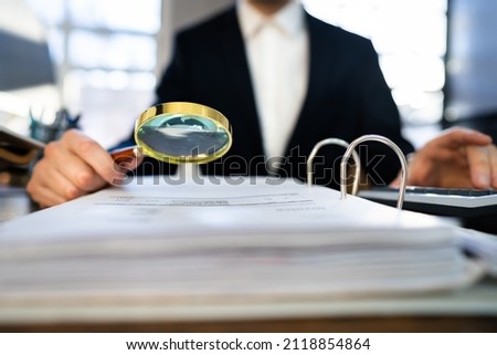 IRS Tax Audit. African Auditor Doing Debt Fraud Inspection Royalty-Free Stock Photo #2118854864
