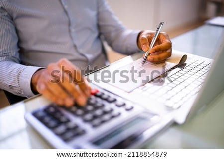 Writing Payroll Compensation Check. Bank Pay Cheque Royalty-Free Stock Photo #2118854879