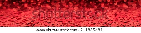 red background of small hearts, long panorama layout defocused