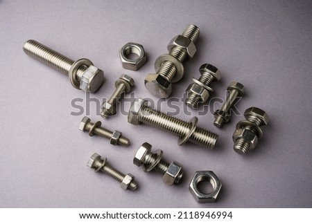 Set of screws of different types, allen, grade 5, hexagonal millimeter, eye bolts, washers, dowel, car screw, clamps. High quality photo