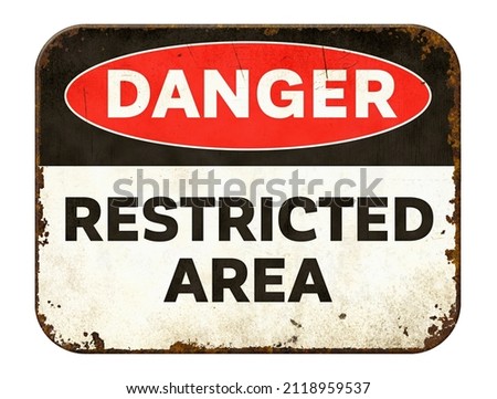 Vintage tin danger sign on a white background - Restricted Area Royalty-Free Stock Photo #2118959537