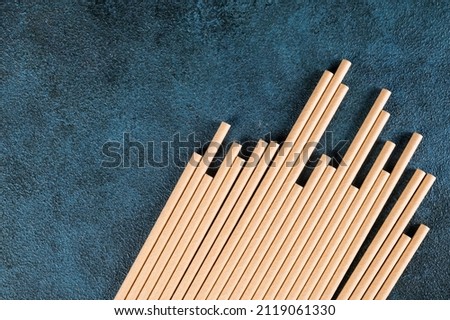 Eco friendly Reusable Straw. Paper cocktail tubes. Kraft paper straw for drinking coffee or tea. Disposable cocktail tube. Zero waste concept. Royalty-Free Stock Photo #2119061330