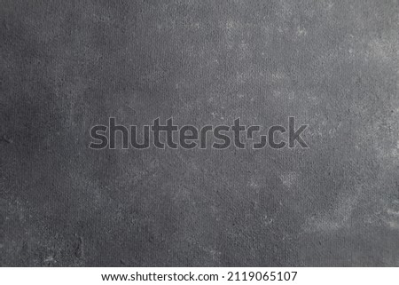 Textural black wall. Black background with a clearly visible texture. Dark background, abstraction. Royalty-Free Stock Photo #2119065107