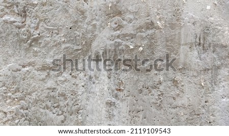 Grey empty concrete wall texture, white plastered wall texture or background, messy street wall