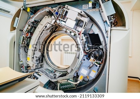 commissioning, installation, repair and maintenance of medical equipment. computed tomography with the cover open.  Royalty-Free Stock Photo #2119133309
