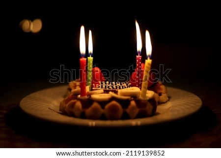 Birthday cake and colorful candles