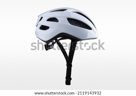 White bicycle helmet isolated on white background. Side view of bicycle helmet Royalty-Free Stock Photo #2119143932