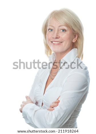 closeup portrait of attractive  caucasian smiling mature woman blond isolated on white studio shot toothy smile face hair head and shoulders looking at camera businesswoman