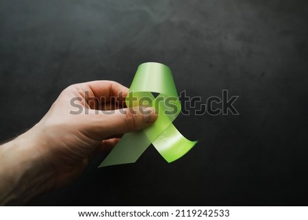 Colored ribbon symbol. Symbol of struggle. Background ribbon.