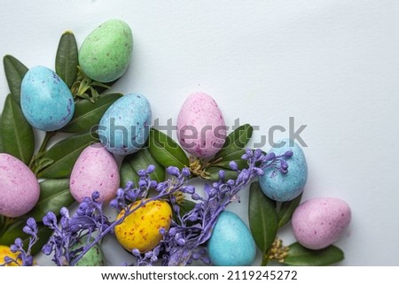 colorful easter eggs with flowers and leaves