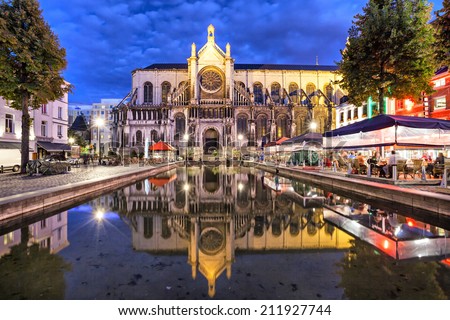 Cathedral of Sainte Catherine, reflecting in water, Brussels, Belgium Royalty-Free Stock Photo #211927744