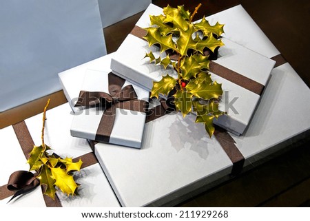 Big bunch of Christmas gifts with mistletoes