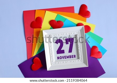 day of the month 27 November calendar    Calendar date in a white frame on a rainbow background.
