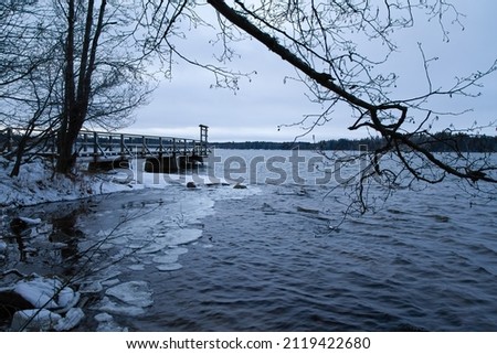 Early snowfall at Lake Littoinen, Kaarina, Finland.