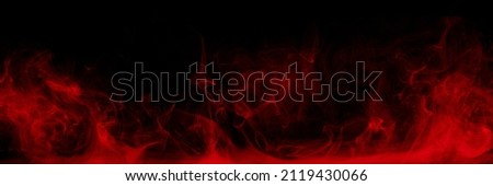 Panoramic view of the abstract fog. Red cloudiness, mist or smog moves on black background. Beautiful swirling smoke. Mockup for your logo. Wide angle horizontal wallpaper or web banner. Royalty-Free Stock Photo #2119430066