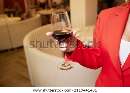 close-up of gorgeous woman with a glass of champagne. party and holiday celebration.